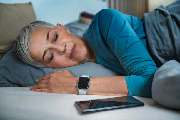 lady with apple watch sleep tracking